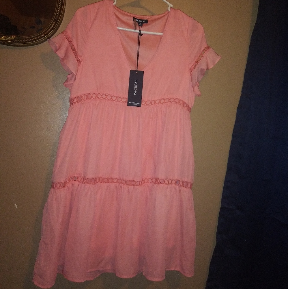 Brand new racheal size small orangey peach color b